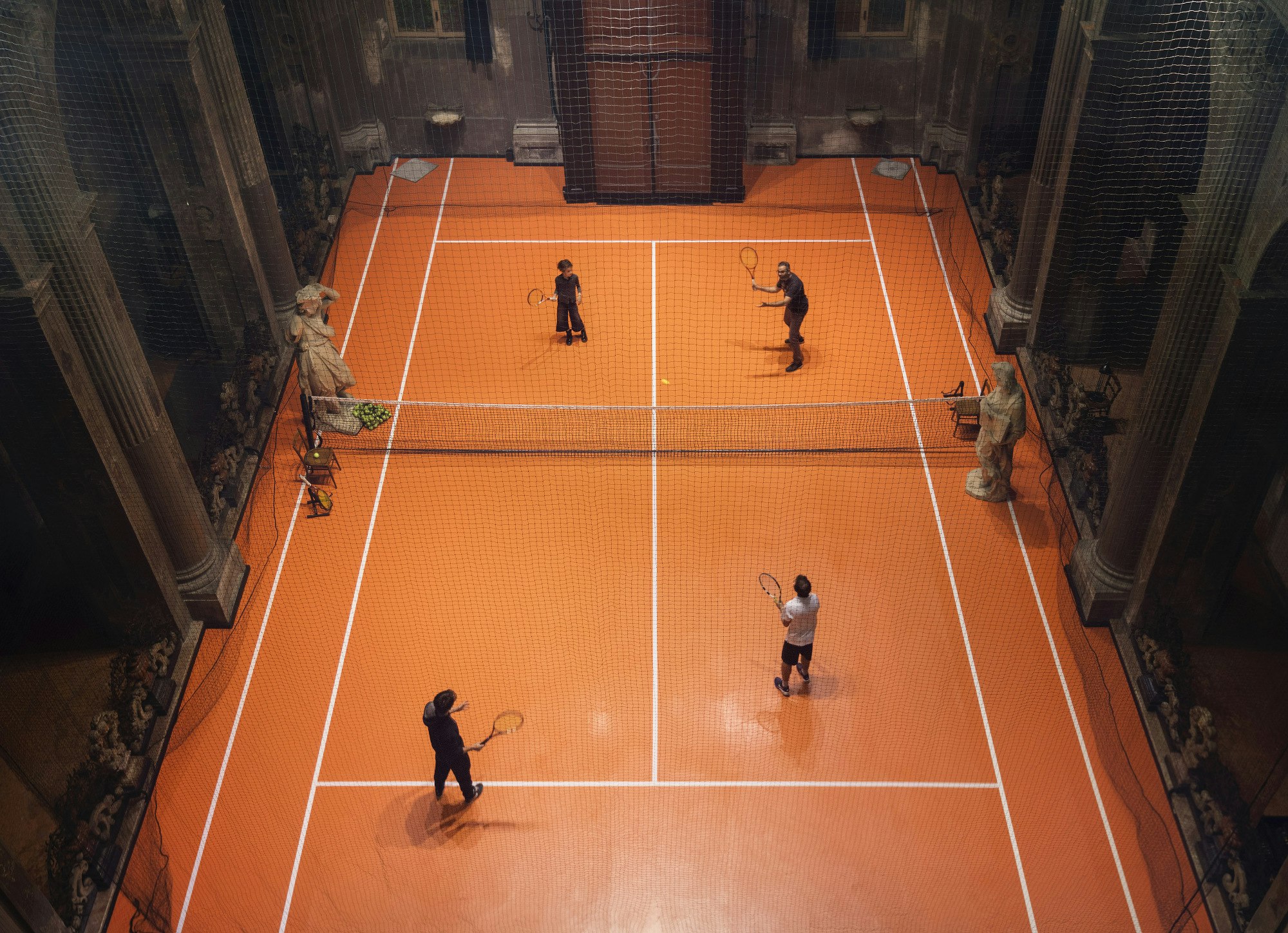 The tennis club is being hosted in the former church of San Paolo in Milan.