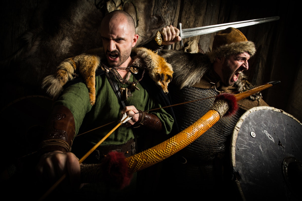 Vikings display their weapons