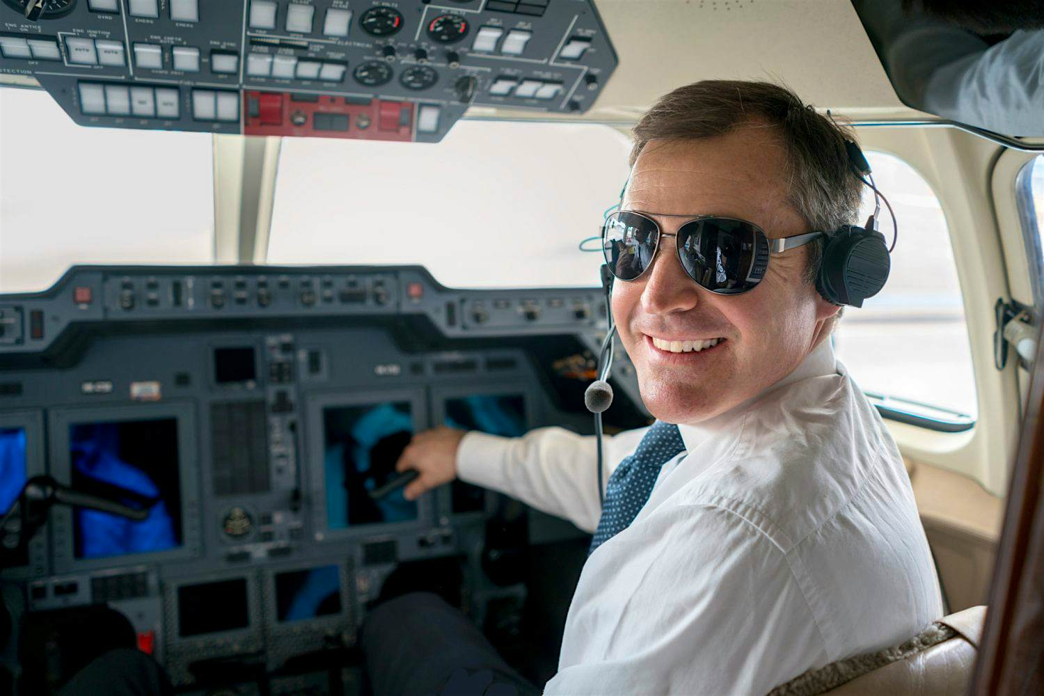 Travel News - Pilot flying a private plane Travel News - Pilot flying a private plane