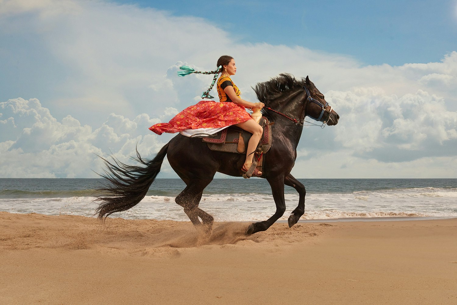A woman from Juchitan captured on horseback.