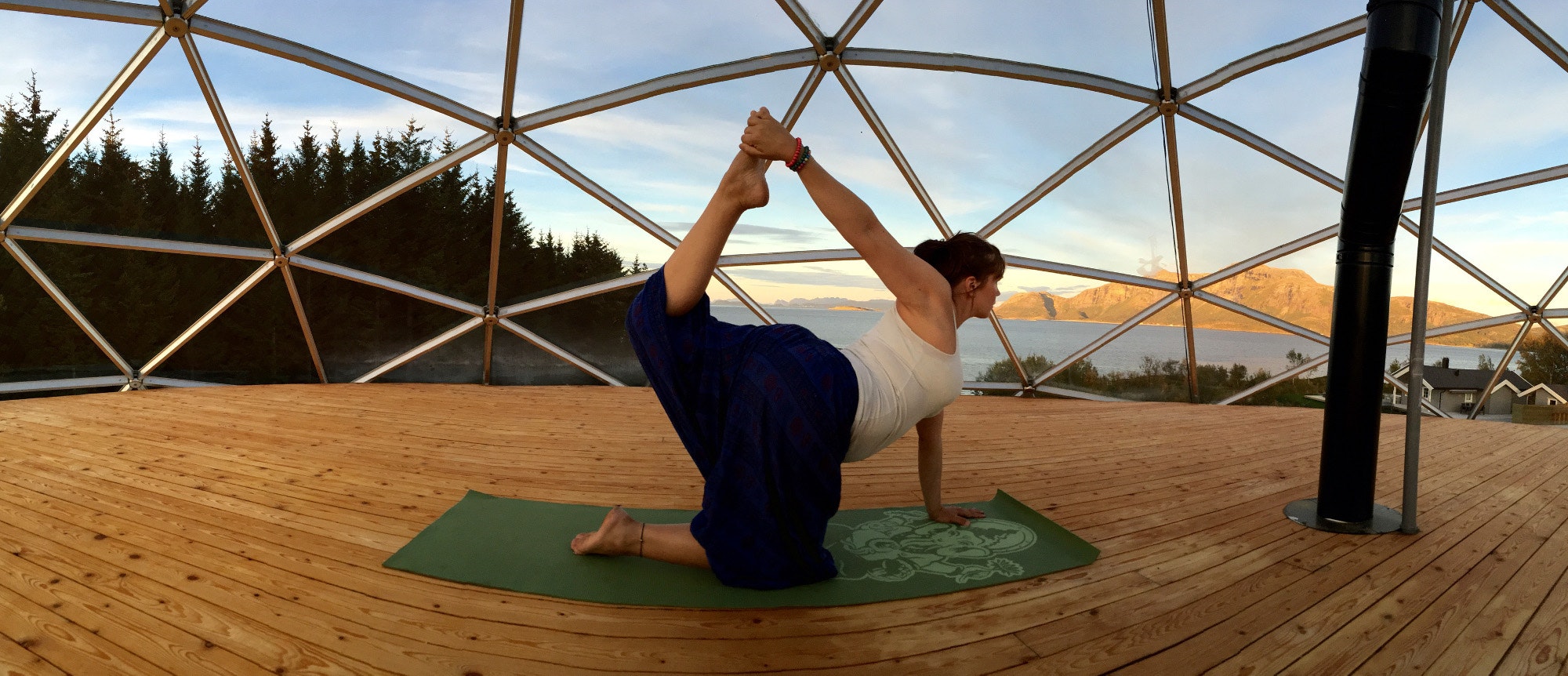 Practising yoga against a stunning backdrop