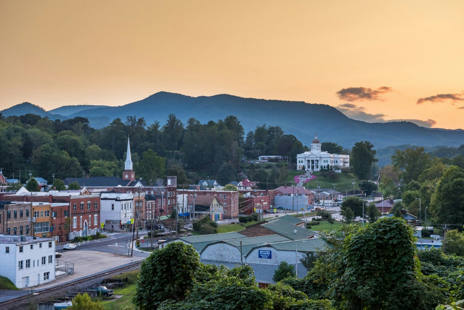 Travel News - Sylva Downtown with the surrounding Mountains at Dusk (1)