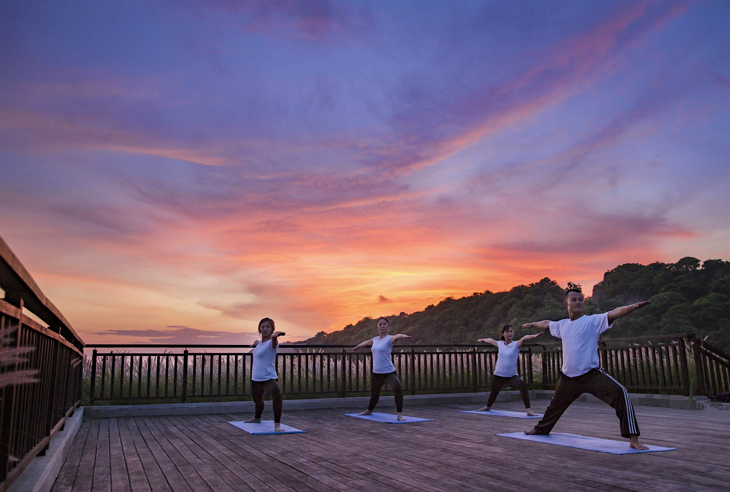 Travel News - Yoga Meditation Guests practice yoga at The Ritz-Carlton Bali.