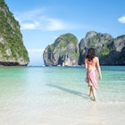 Travel News - Adult woman in bikini on tropical beach, Thailand