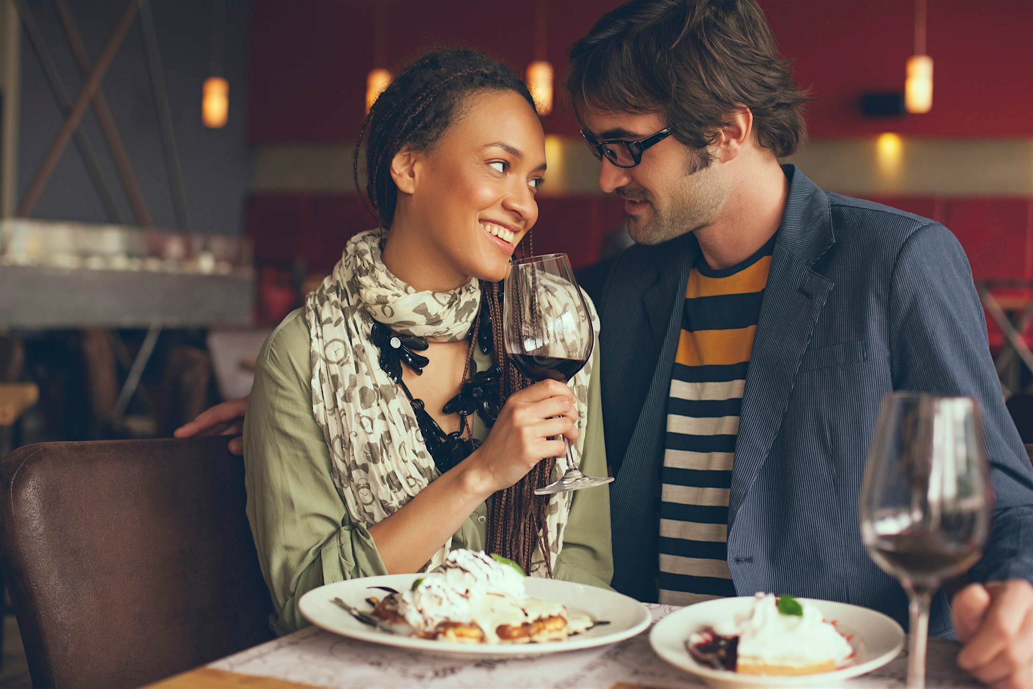 Travel News - Couple eating dinner in cafe Travel News - Couple eating dinner in cafe