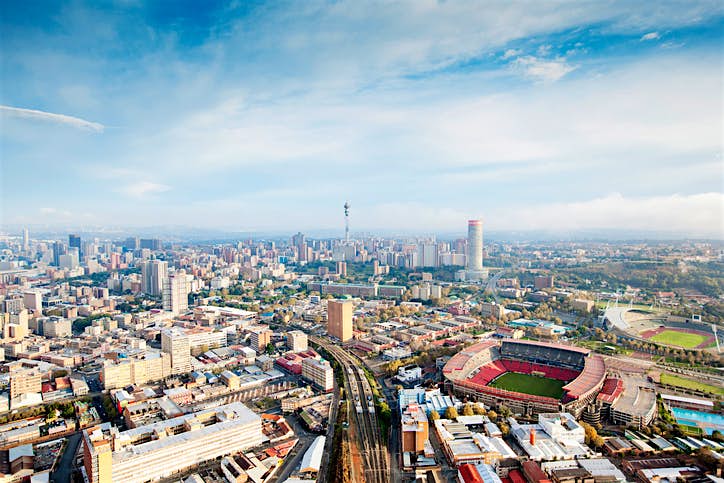 Travel News - Skyline of Johannesburg with Ellis park stadium, Gauteng Province, South Africa Skyline of Johannesburg with Ellis park stadium, Gauteng Province, South Africa
