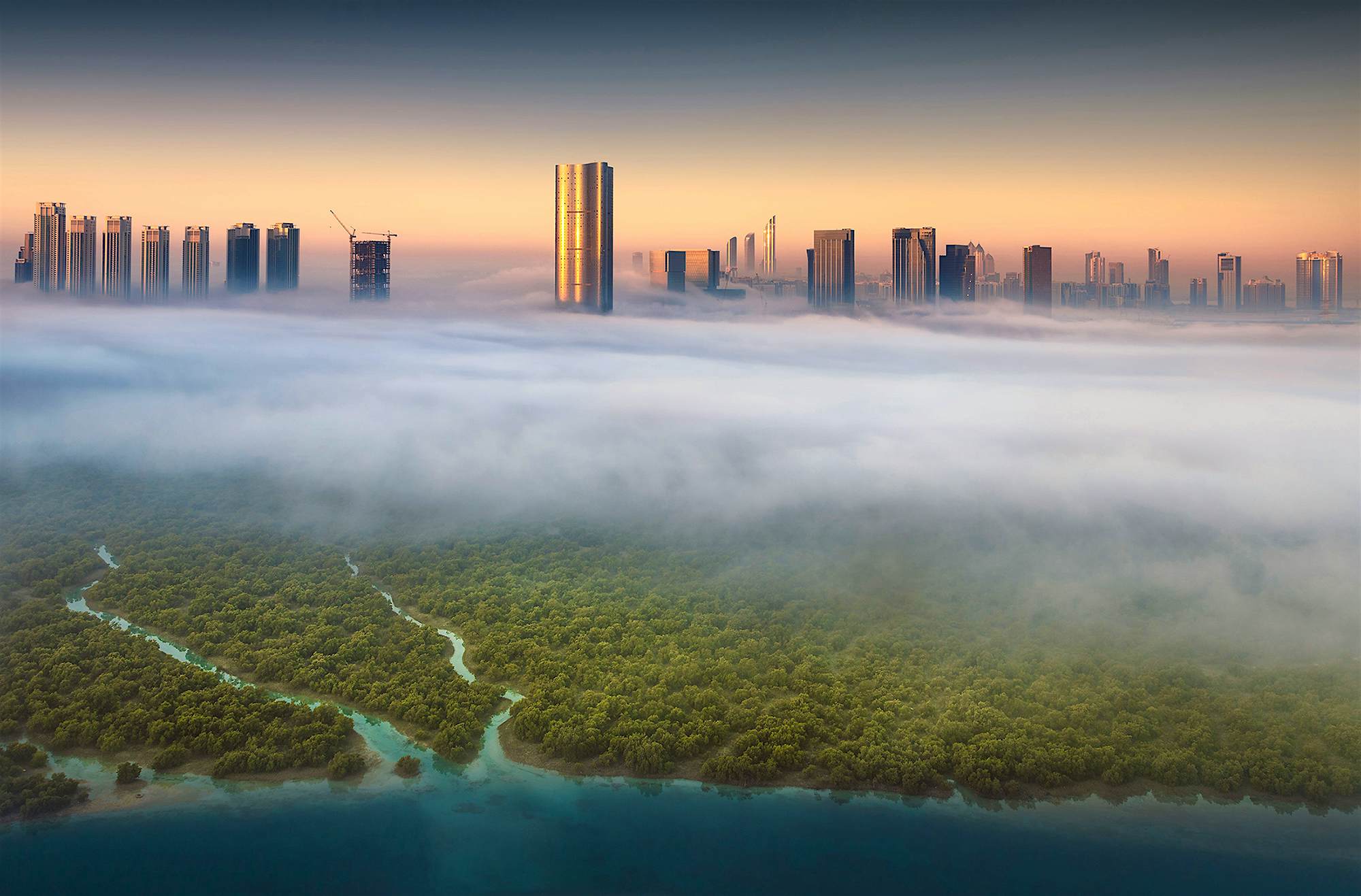 Travel News - The city looks magical during winter months Haunting shot of Abu Dhabi in the fog