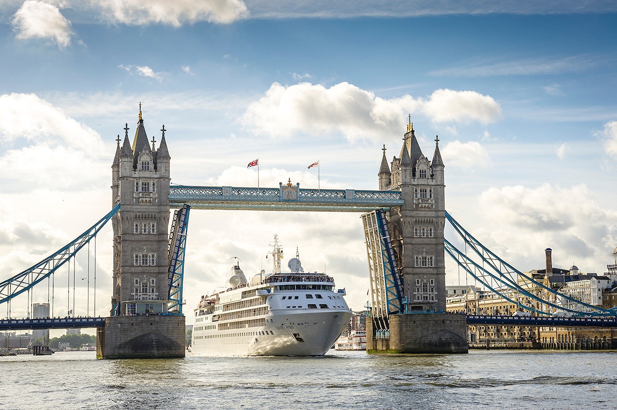 A cruise ship pictured sailing under London's Tower Bridge in 2017.