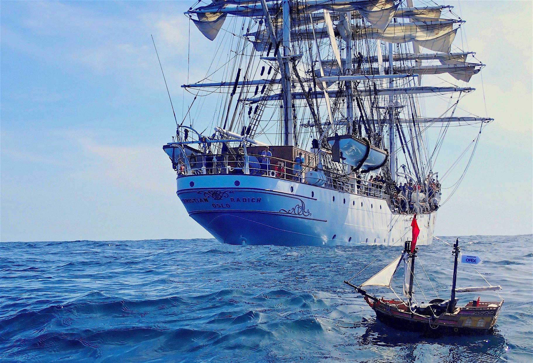 Travel News - Adventure ship The Adventure beside the Christian Radich, which carried it to West Africa.