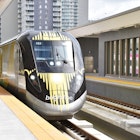 A Brightline train arriving at MiamiCentral station.
