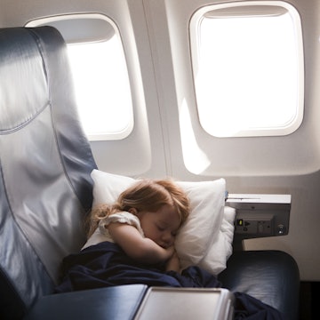 Travel News - girl (2-3) sleeping in airplane seat