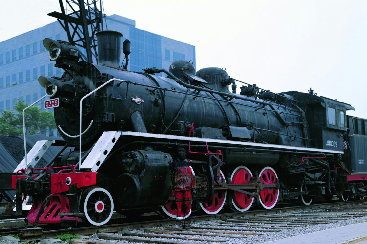 Travel News - Liu Bolin Hiding in the City No.73 Decorated With Locomotive Bel-Air Fine Art London (Beijing) 2008