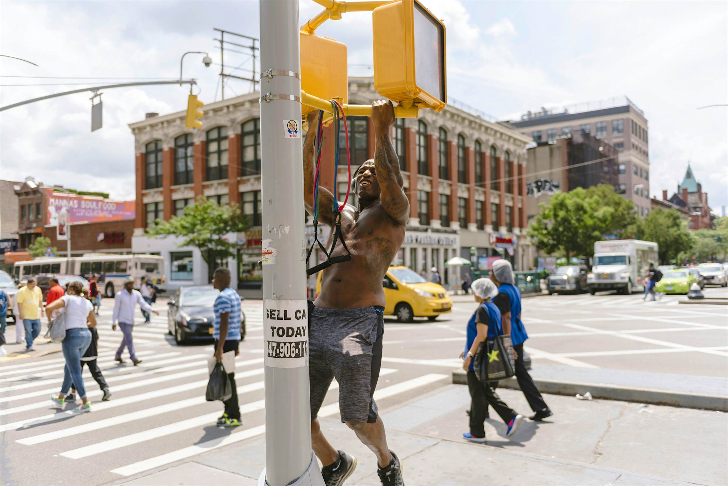Travel News - A man works out on Dr Martin Luther King Jr Blvd (aka 125th St) in Harlem. Travel News - A man works out on Dr Martin Luther King Jr Blvd (aka 125th St) in Harlem.