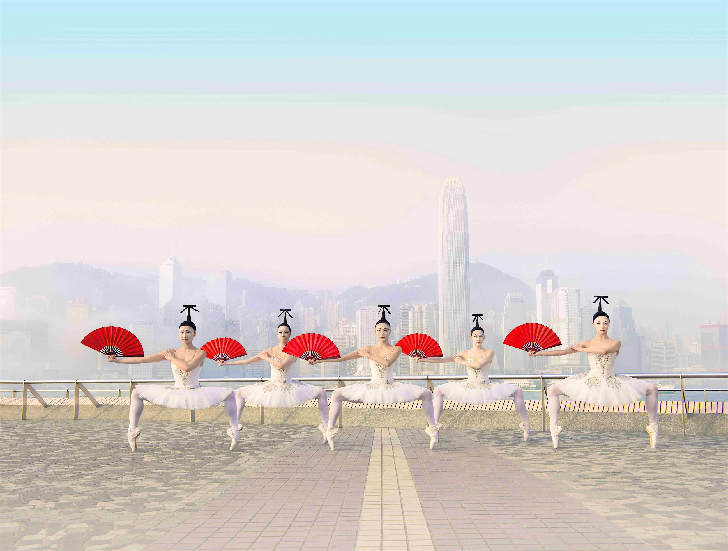 Travel News - HKBallet Dancers Gao Ge, Chaelee Kim, Liu Miaomiao, Lauma Berga, Zhang Xuening with Hong Kong Island in the background.