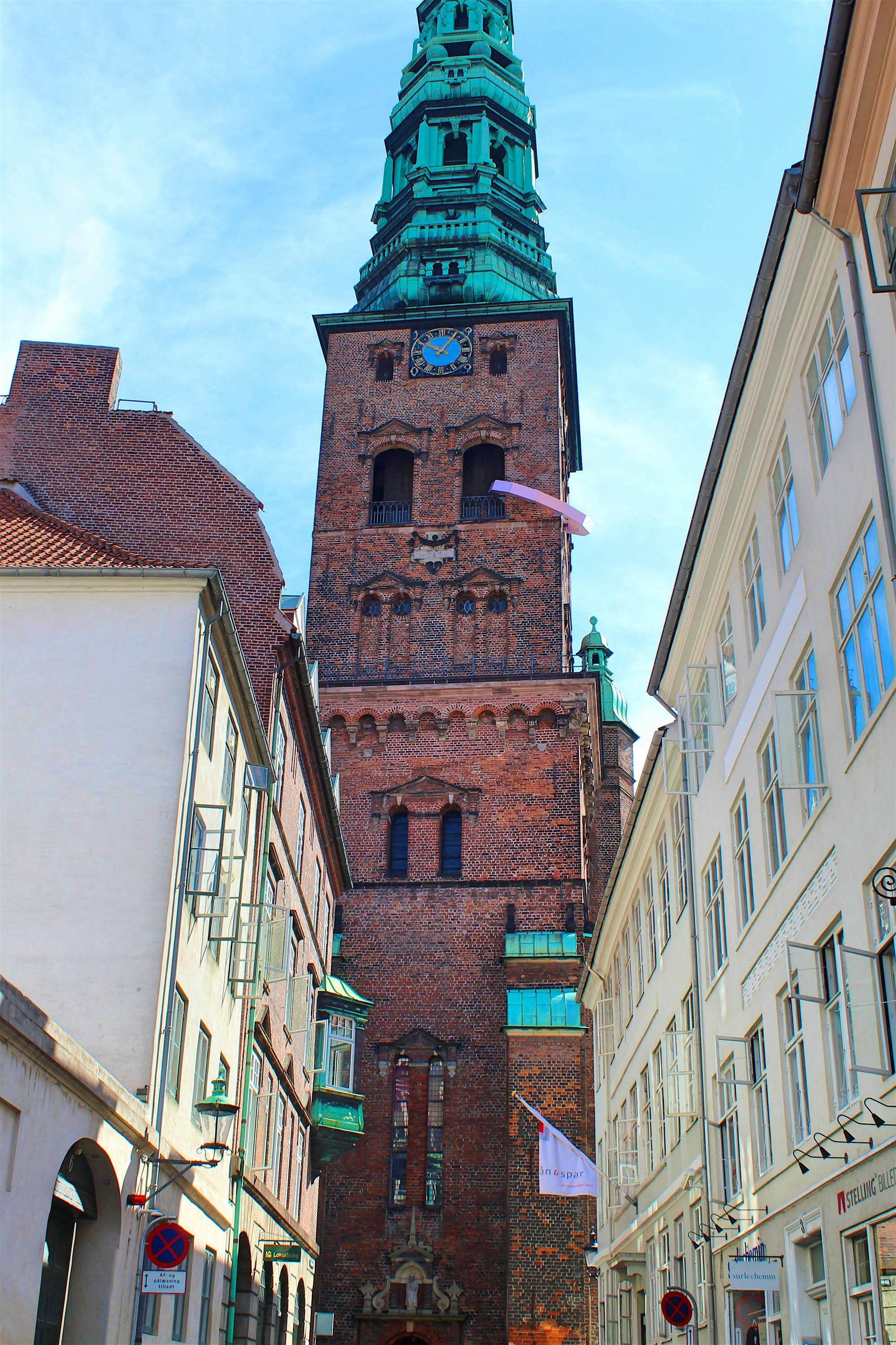 Travel News - Nikolaj Kunsthal Tower Copenhagen's Nikolaj Kunsthal Tower is sporting a pink ring.