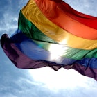 Rainbow Flag against blue sky