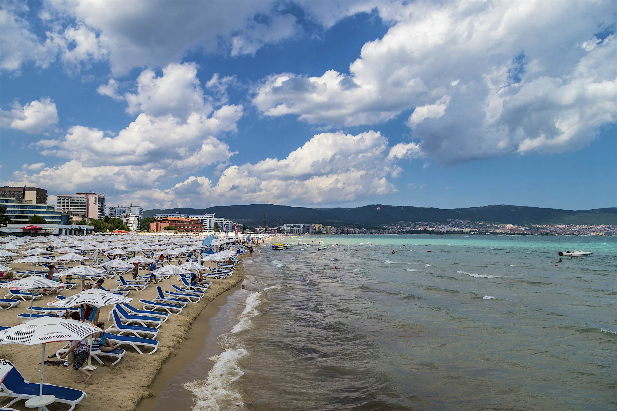 Travel News - Bulgaria (Sunny beach), Slanchev Bryag Slanchev Bryag is a major seaside resort on the Black Sea coast of Bulgaria, located approximately 35 km north of Burgas in Nessebar municipality, Burgas Province. Sunny Beach has a very small permanent population, but during the summer the resort is home to many thousands of tourists. The main strip of high-rise hotels backing onto the beach is several kilometres long and extends along a wide bay between Sveti Vlas and Nessebar.