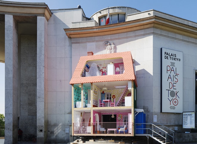 The giant doll's house is part of the CHILDHOOD show