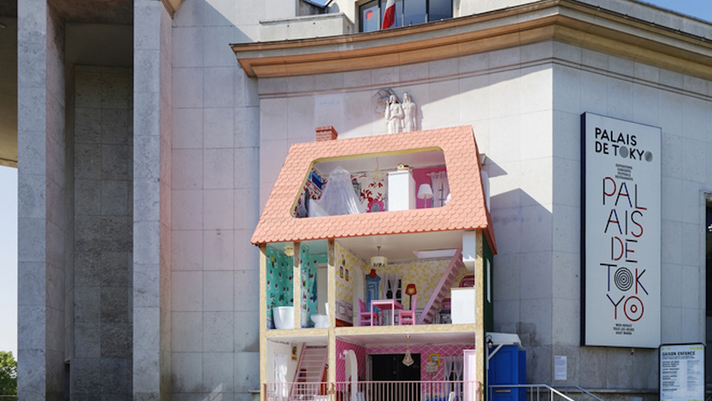 The giant doll's house is part of the CHILDHOOD show