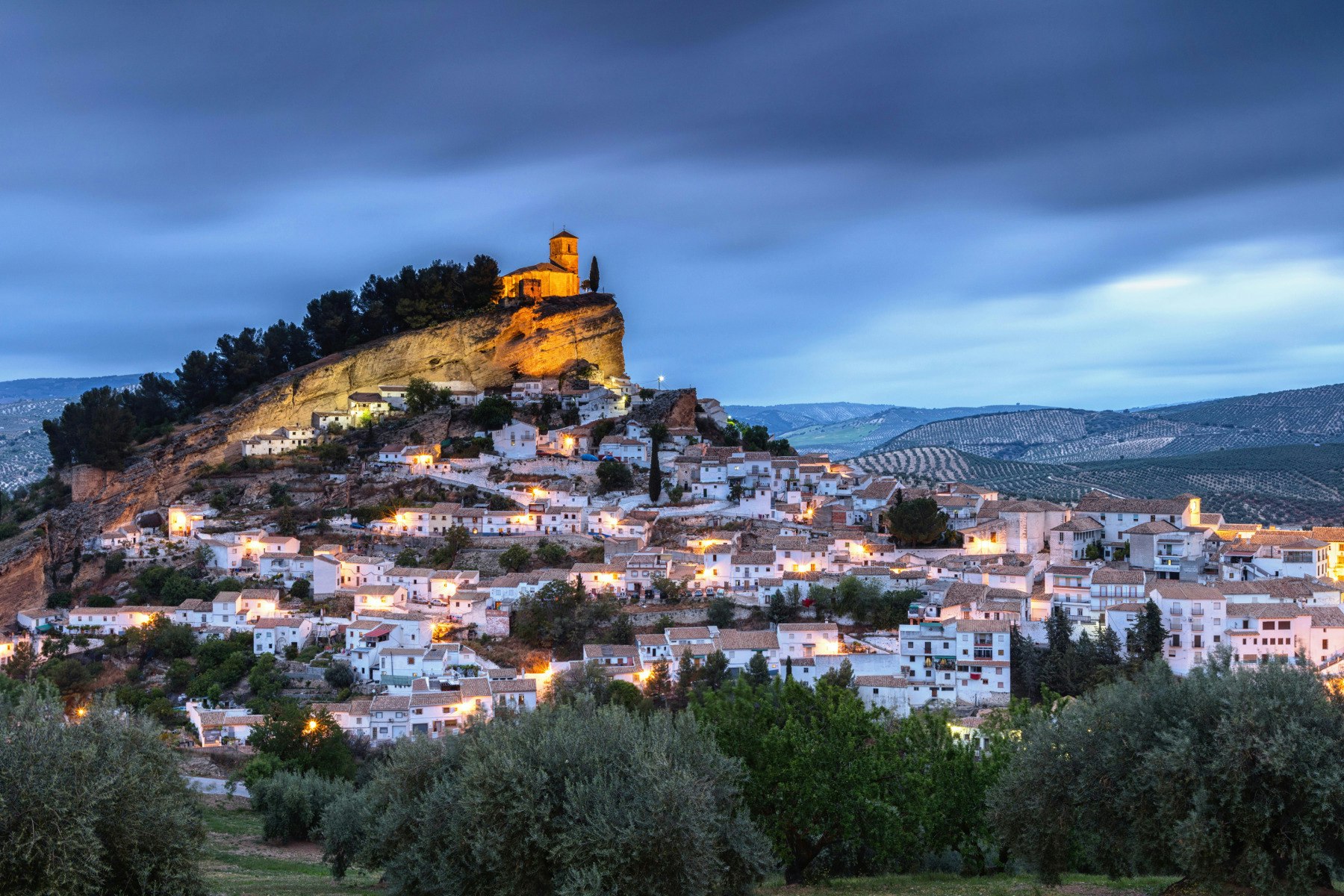 Travel News - Spanish castle on a hill above a village