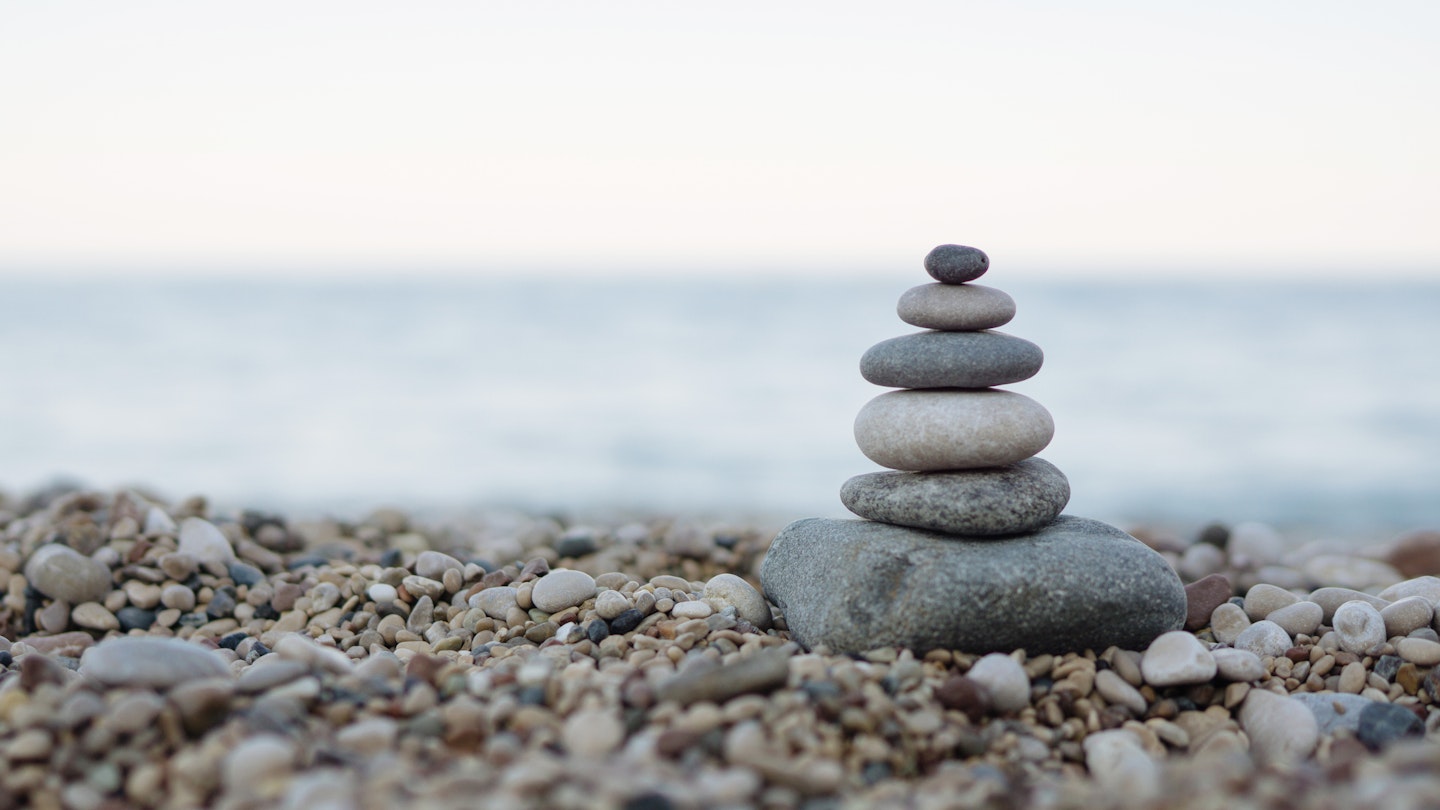 Balanced stones on a pebble beach