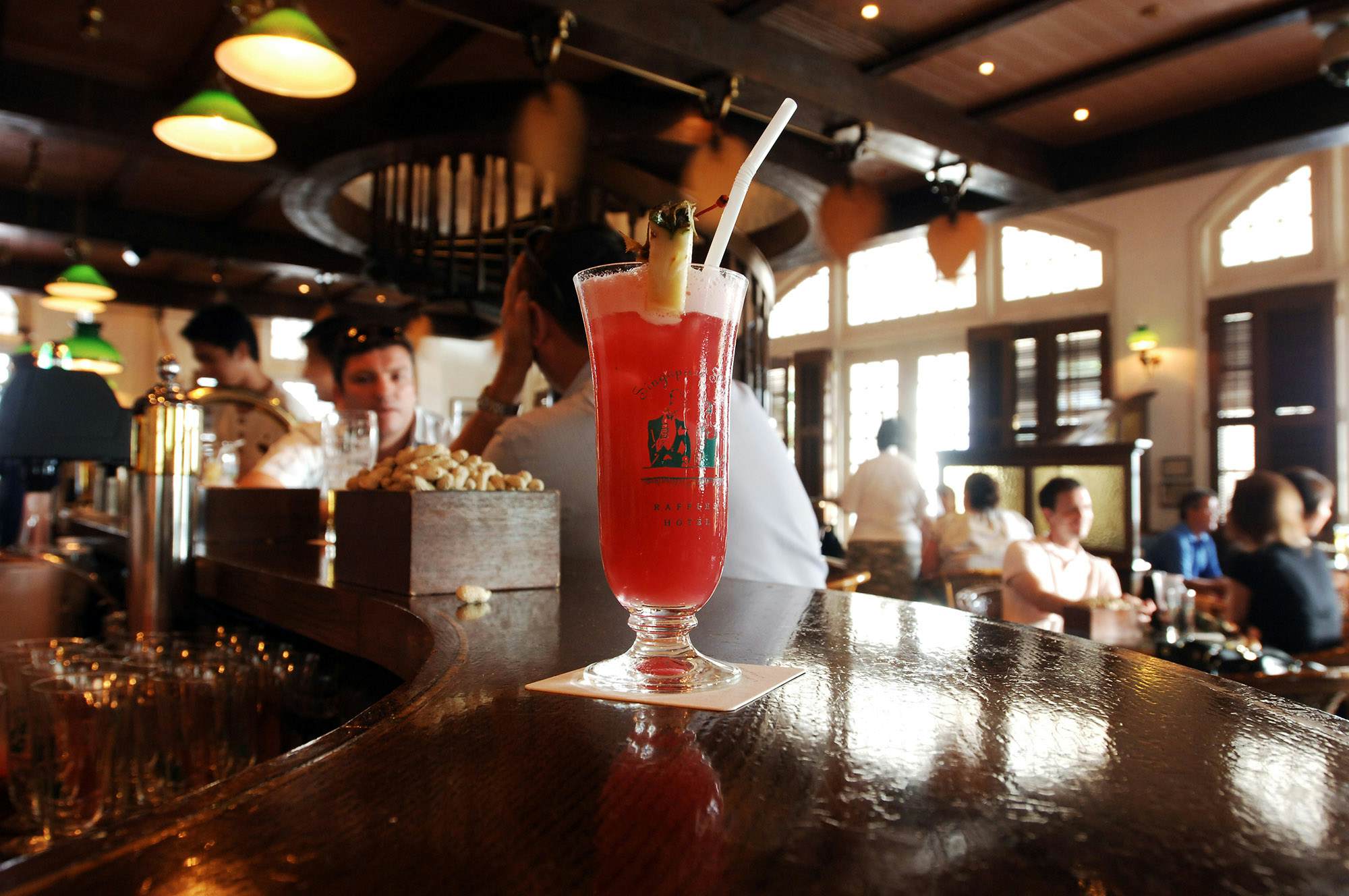 Raffles Hotel’s iconic Singapore Sling returns home to the Long Bar