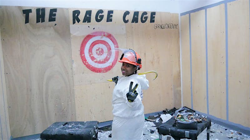 Travel News - ragecage3 A woman in a safety helmet giving the peace sign.