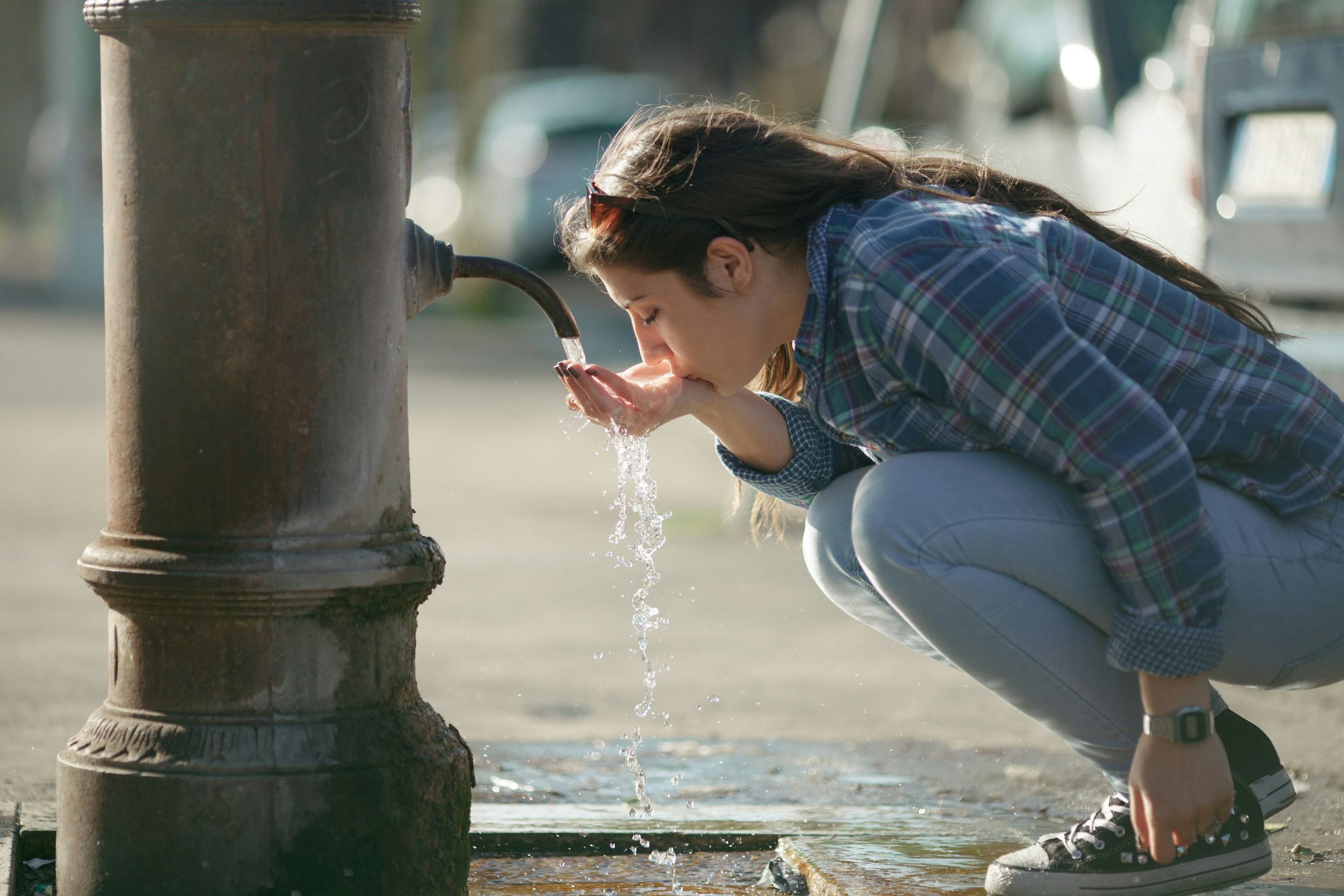Travel News - Young girl drinking water