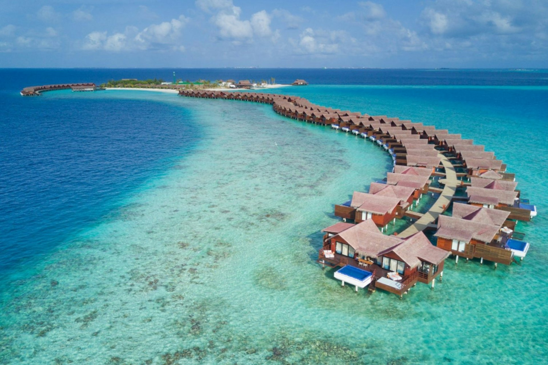 The overwater villas at the Grand Park Kodhipparu