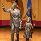 A bronze statue of former US president, Barack Obama, and his daughter Sasha.