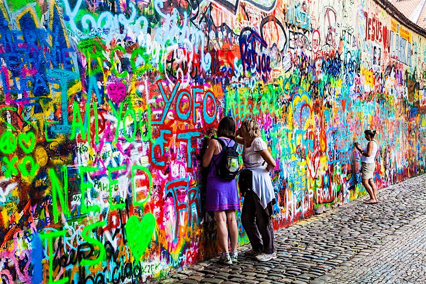 Graffiti Daubed By Visitors On The Famous John Lennon Wall In Prague Will Now Be Strictly Regulated Lonely Planet
