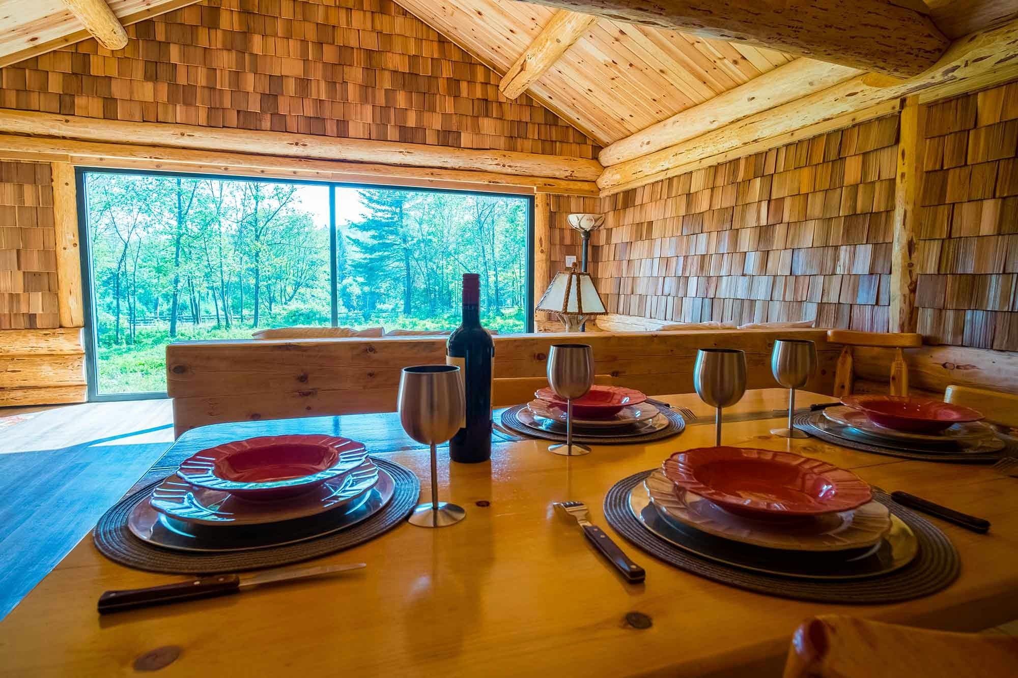 Experience this 'wolf cabin' at Parc Omega
